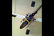 Trex 500 RC Heli mounted to wall using skid clamps