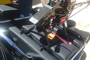 RC heli on back of motorcycle uses Random Heli Skid Clamps and T-Track