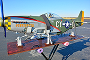 Large Radio Controlled P51 airplanes are transported on a slide-out platform and secured with Random Heli Gear Jacks.