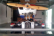 Gear Track and Gear Jacks mounted on shelf in cargo trailer for RC airplane transport