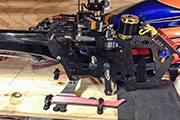 SAB Goblin Speed heli is secured for transport using modified Random STC6377LP Heli Skid Clamps.