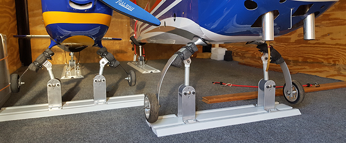 RC airplane landing gear secured (tied down) for transport in trailer using Random Heli Gear Jacks Strut Supports