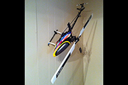 Trex 500 RC Heli mounted to wall using skid clamps