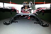 Skid Clamps secure Quad copter to RC transmitter case.